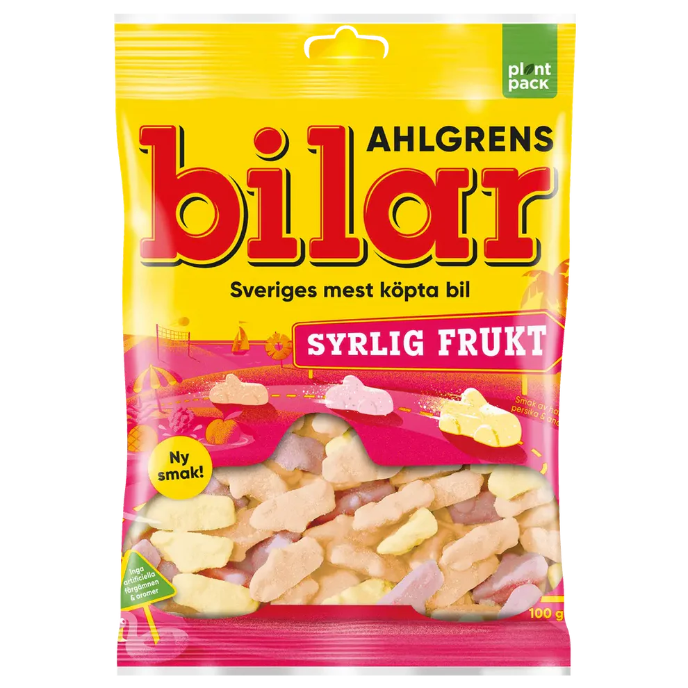 Packaging of Ahlgrens bilar syrlig frukt candy with yellow and pink design.