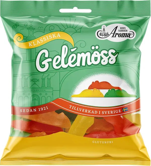 Packaged product with 'Aroma' branding and colorful gummy mice on a green and yellow background.